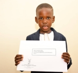 Kabaka thanks a young boy, who wrote him a letter congratulating him on his 70th birthday